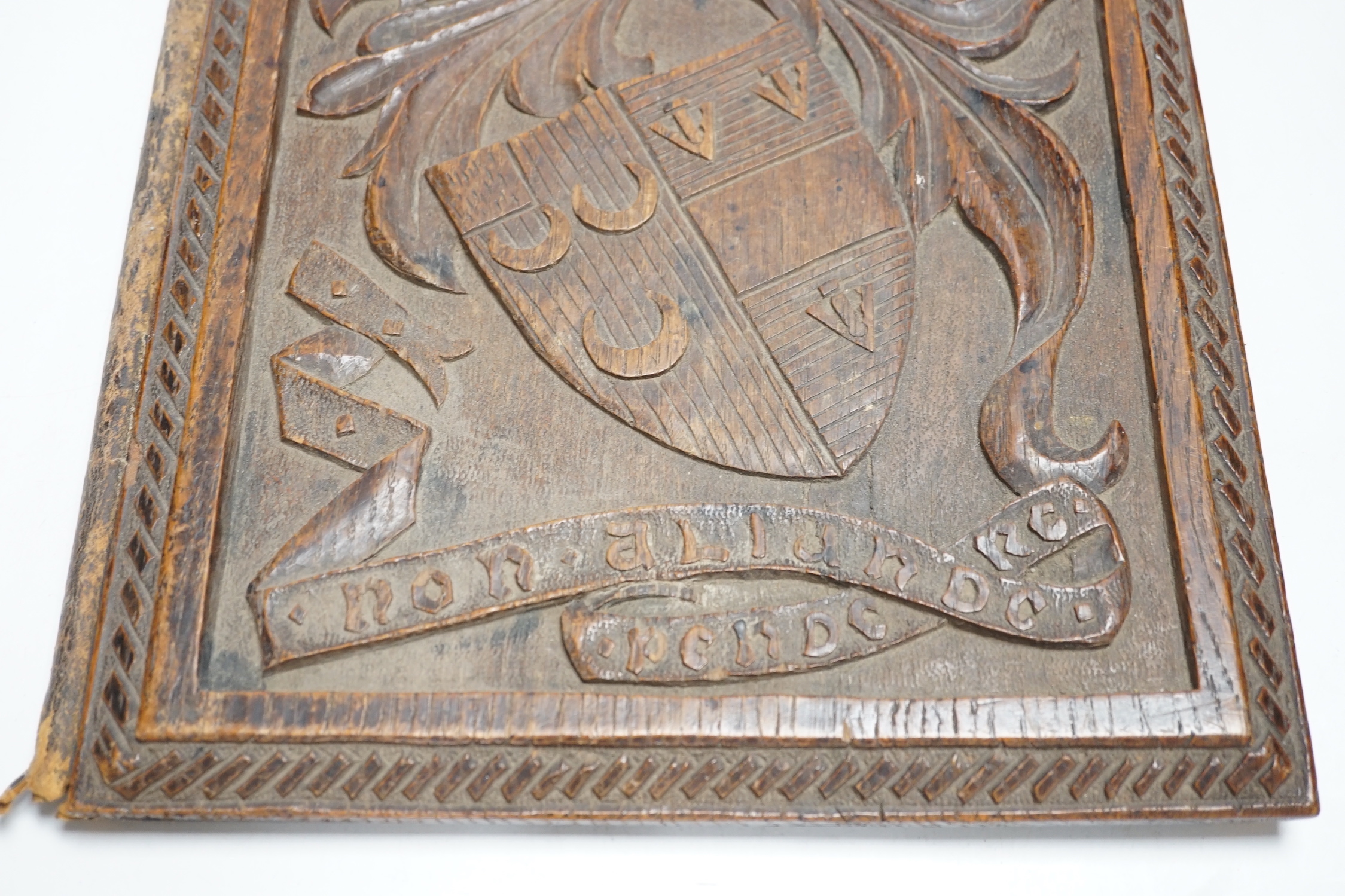 A late 19th century carved oak ink blotter with motto ‘Non Aliunde Pendere’ 38cm high